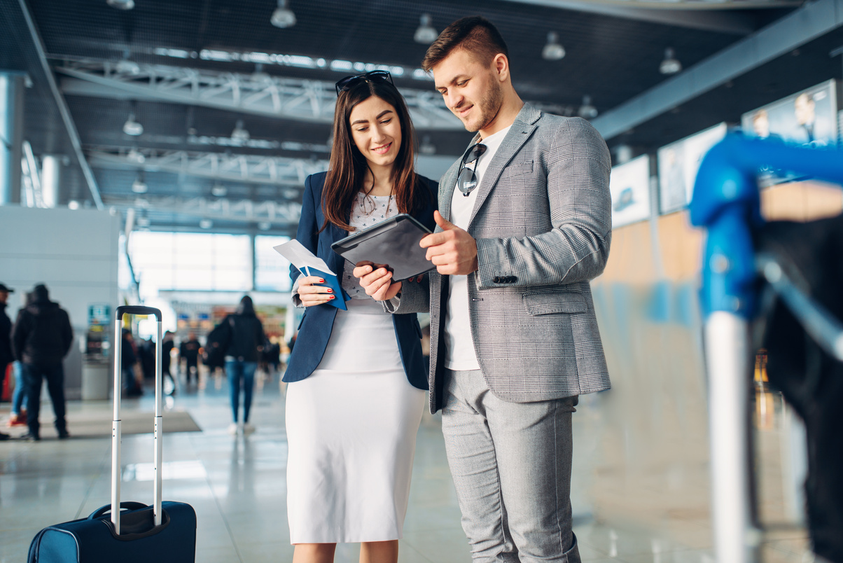 Two Passengers in Airport, Working Trip
