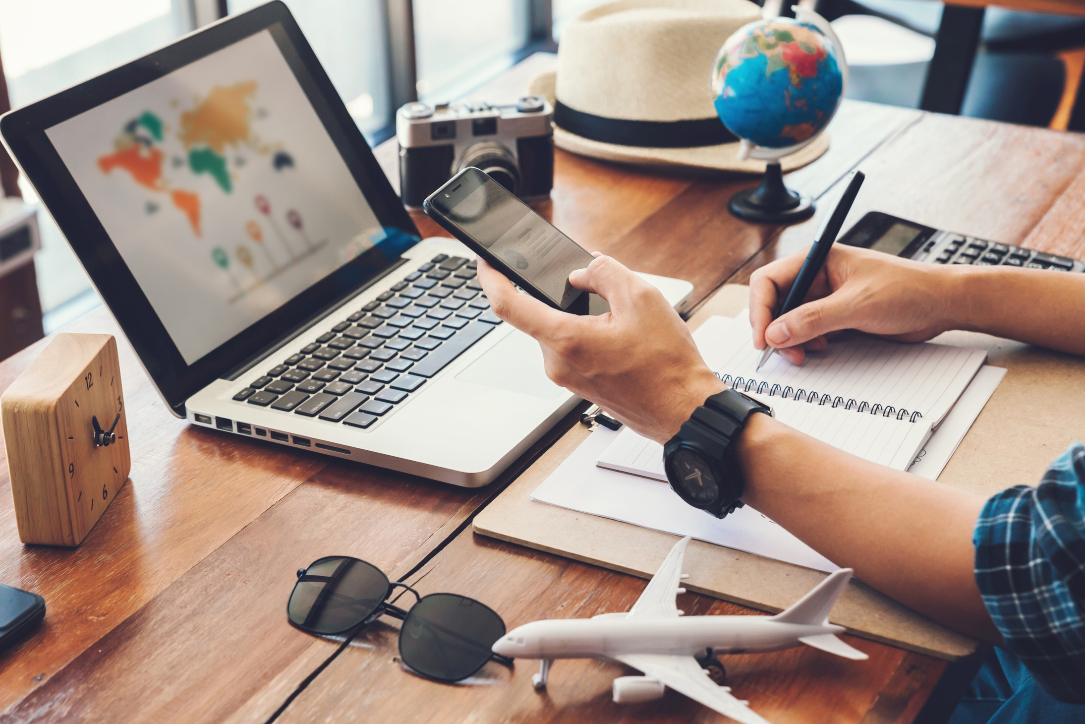 Person Planning Vacation Trip and Searching Information Online 